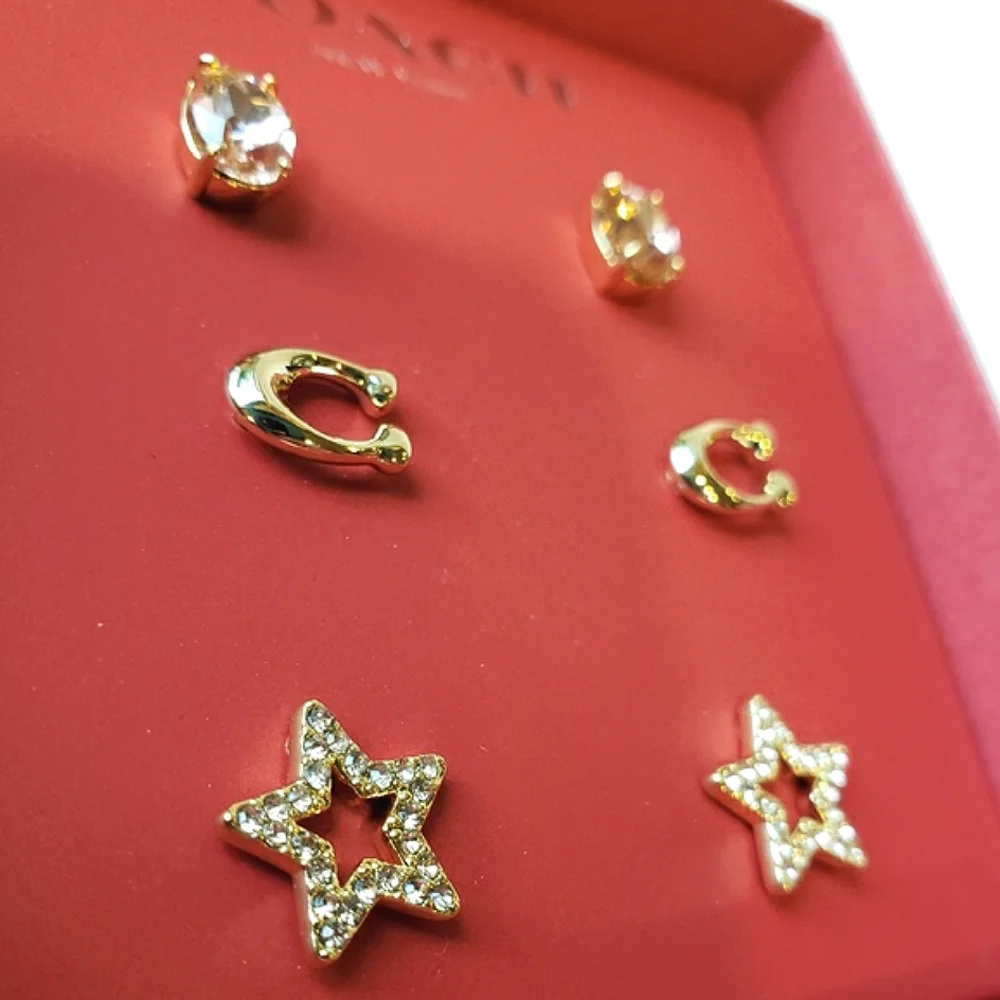 Coach Signature Star Earrings Set. 3 pairs in gift box. Pink, gold tone